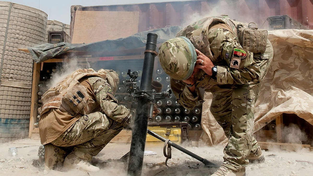 A mortar team from Ghurkha Reinforcement Company attached to 1st Battalion, The Mercian Regiment (Cheshire) fires on insurgents outside Forward Operating Base Khar Nikar in Afghanistan 20.07.10 CREDIT Crown Copyright