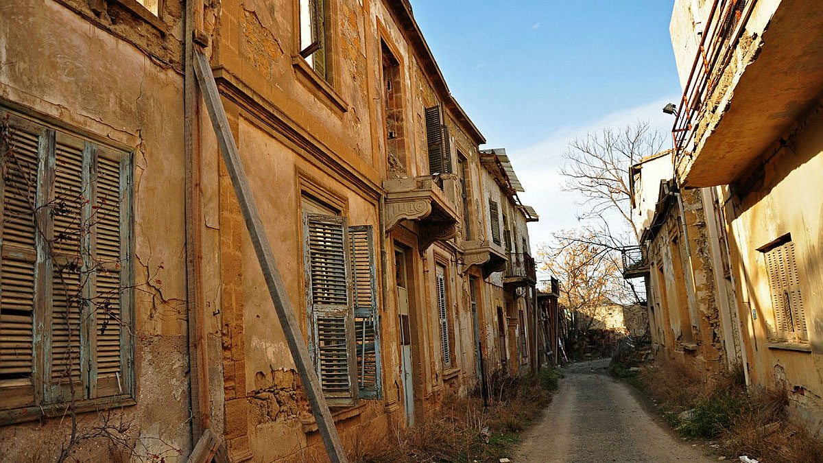 A photo of Nicosia's Buffer Zone, which shows abandoned, shot up buildings left empty when the 'Green line' was drawn CREDIT Crown Copyright