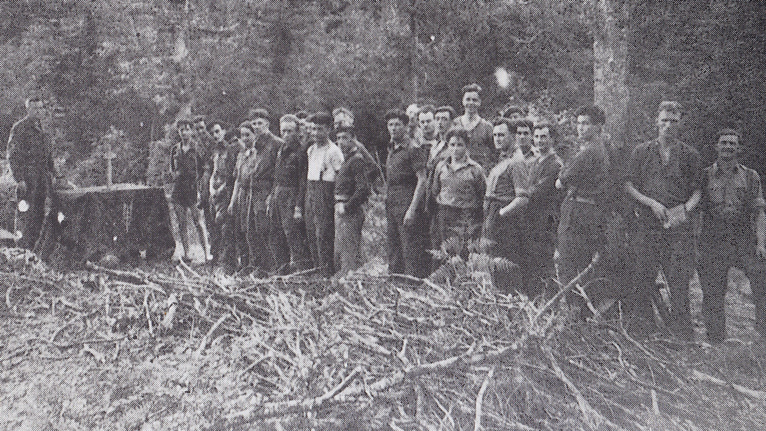 A service in the woods in enemy occupied France in 1944. Padre Fraser McLuskey stands beside the improvised Communion Table CREDIT Rev Andrew McLuskey