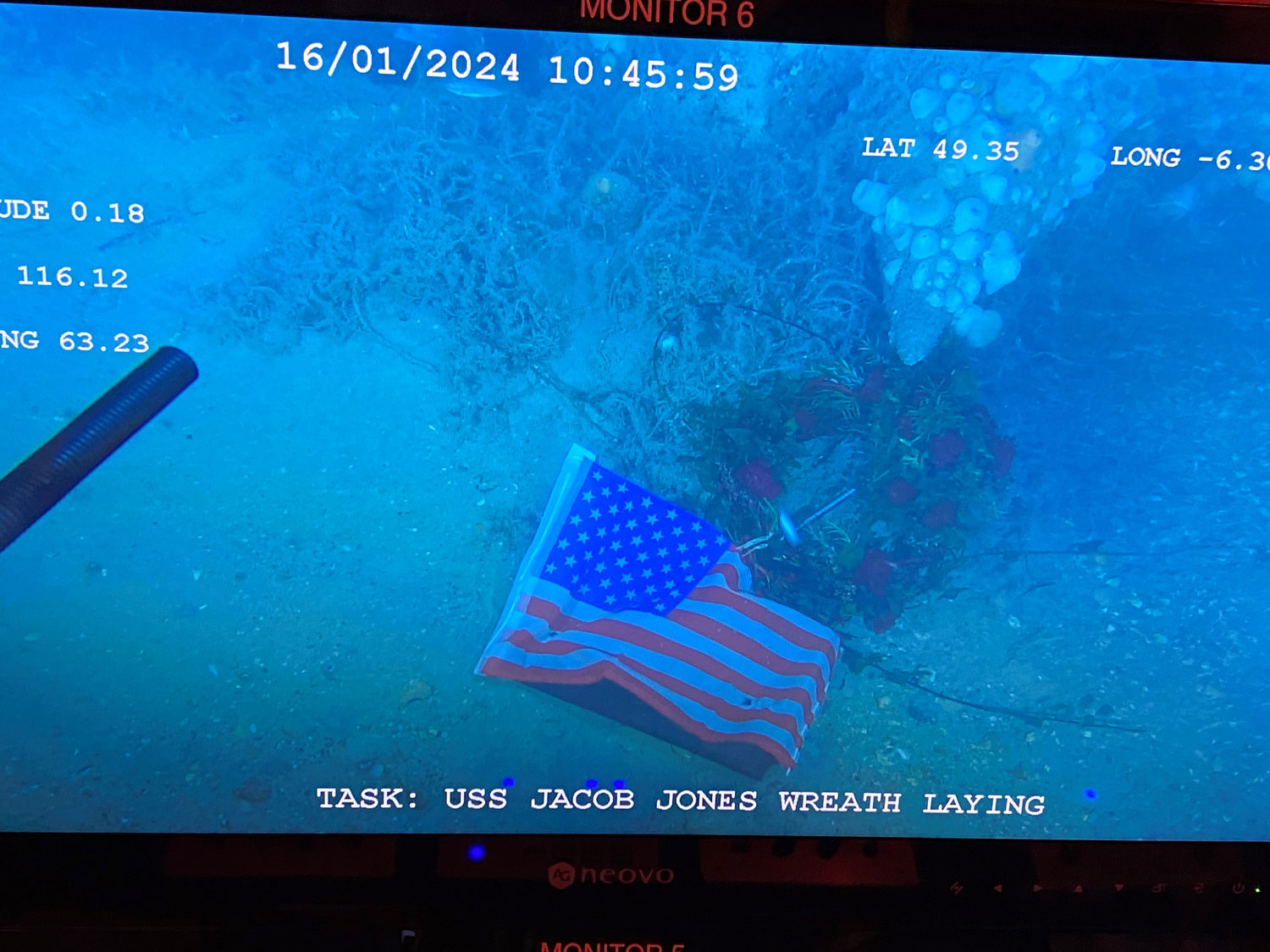 A wreath and a Stars and Stripes flag were placed on USS Jacob Jones wreck to honour all who died CREDIT Crown Copyright