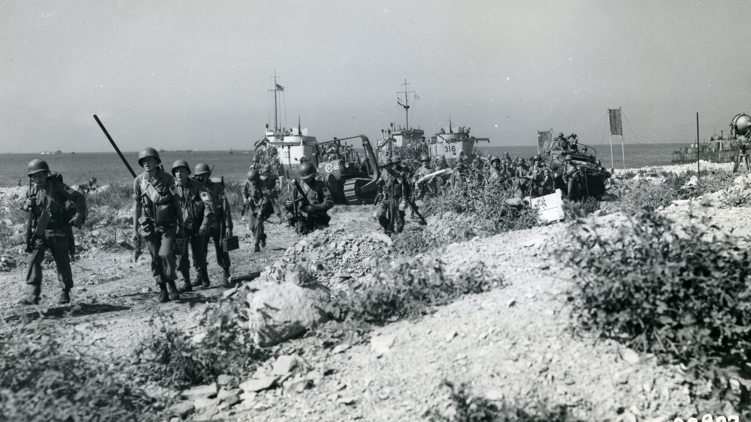 Allied troops swarm ashore on 15 August 1944 during the invasion of southern France CREDIT National Archive and Records Administration