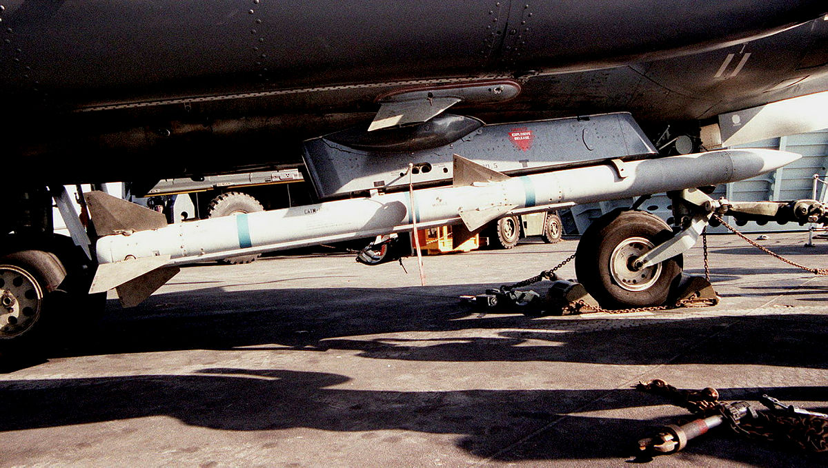 RAF AMRAAM missile shown below a Sea Harrier in 1997