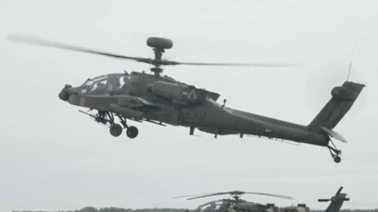 An Apache helicopter flying over the training ground during Exercise Griffin Shock (Picture: Nato).