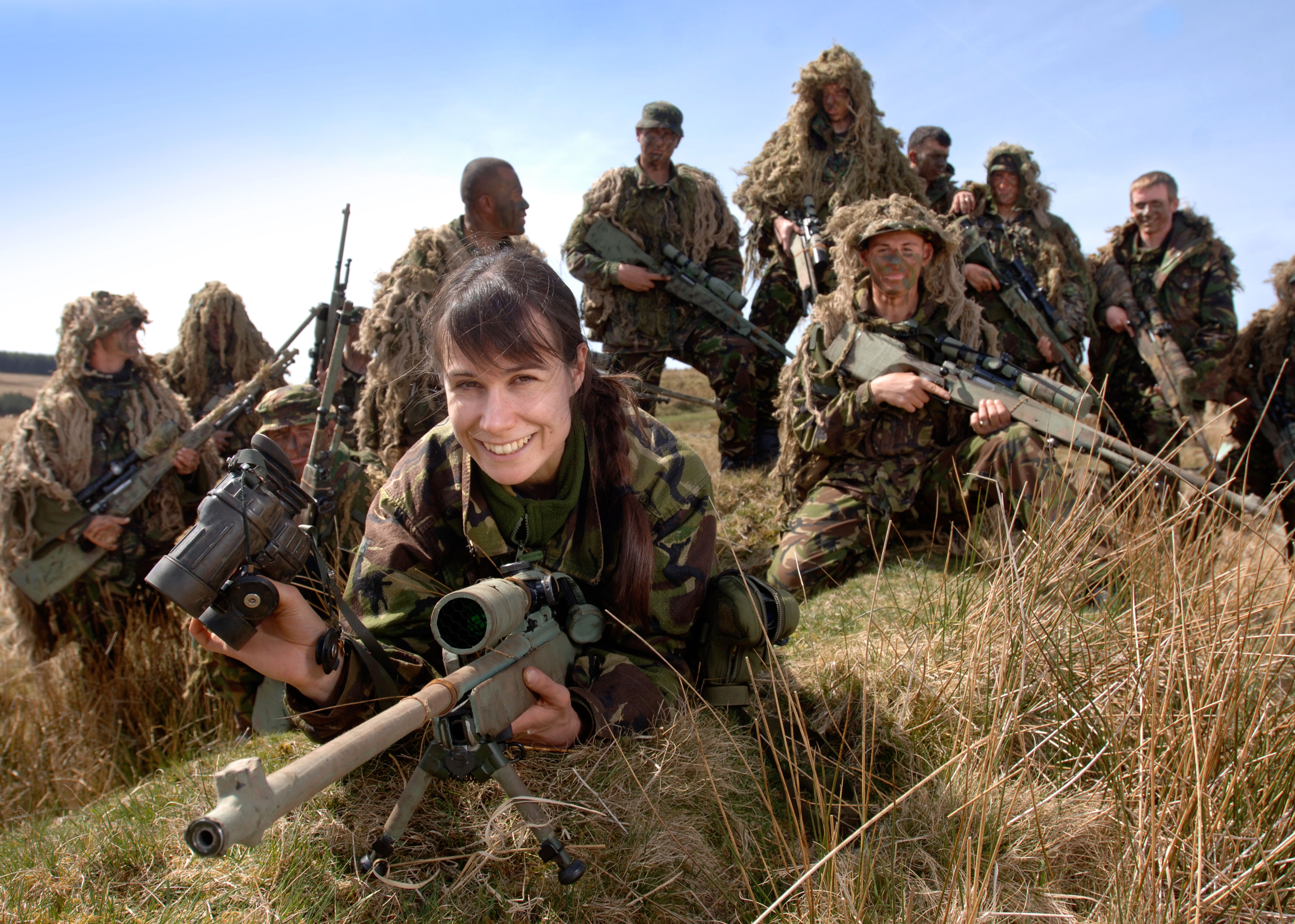 A BRITISH ARMY FEMALE RECRUIT AT A FIRING RANGE IN BRECON WALES DURING A SNIPER TRAINING COURSE