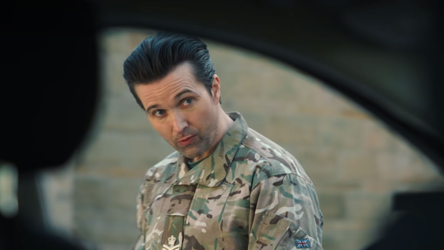 Actor Emmett J. Scanlan wearing a military uniform in Fool Me Once CREDIT Netflix