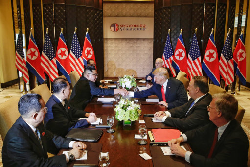 Advisers from the two nations joined President Trump and Mr Kim (Picture: PA).