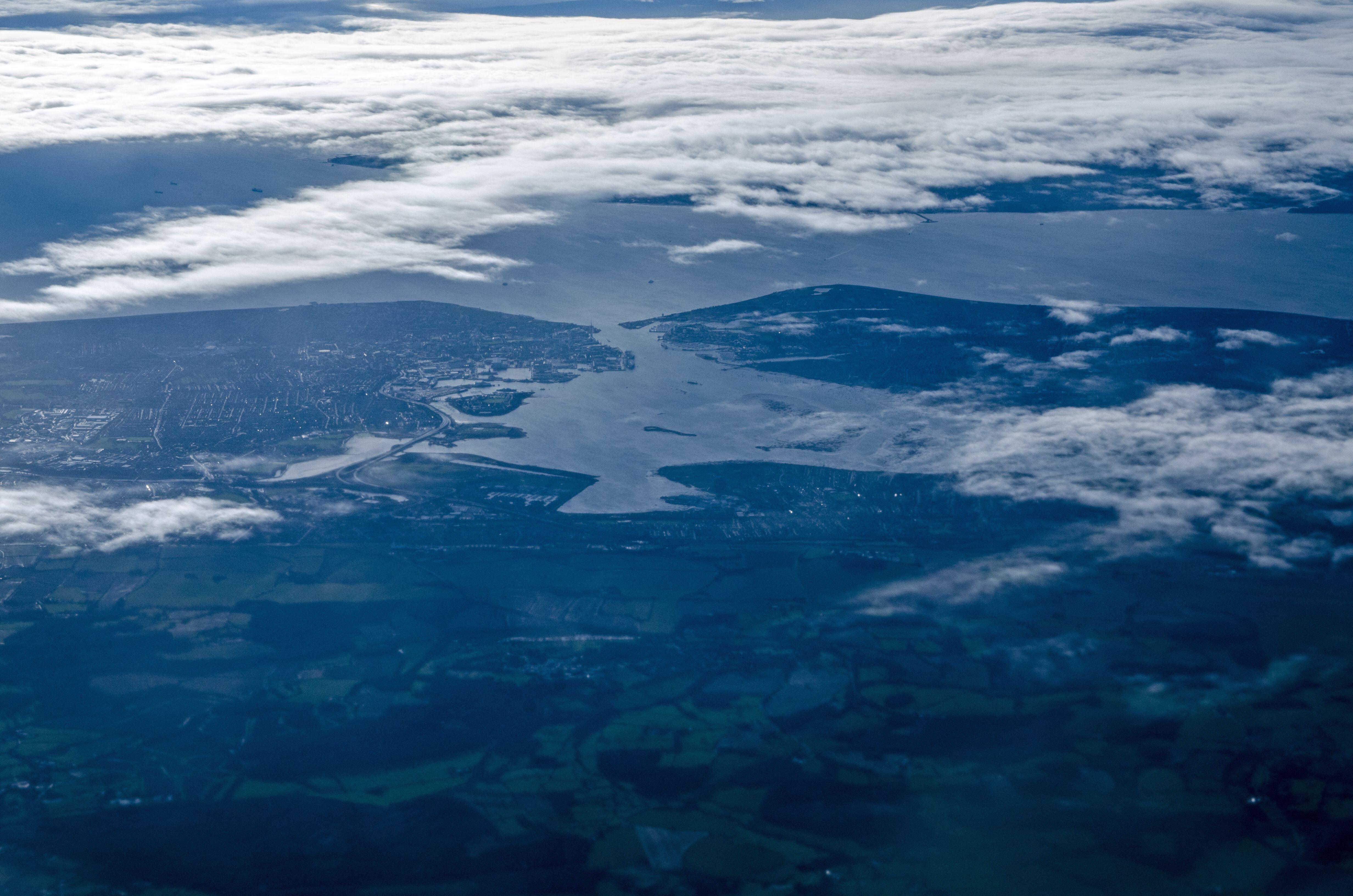 Aerial of Portsmouth Harbour on the left, Gosport on the right and Isle of Wight at the top