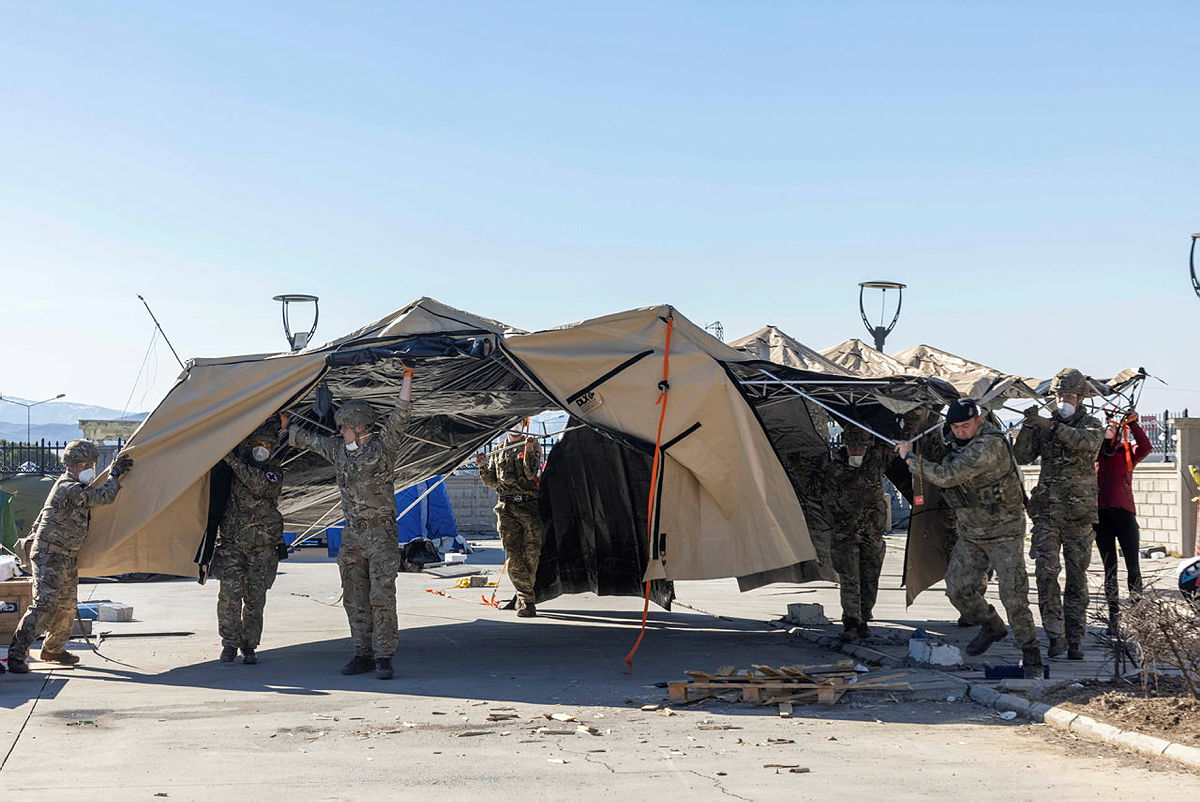 Airborne medics support the EMT team by moving vital equipment away from the hospital in Turkoglu. 
