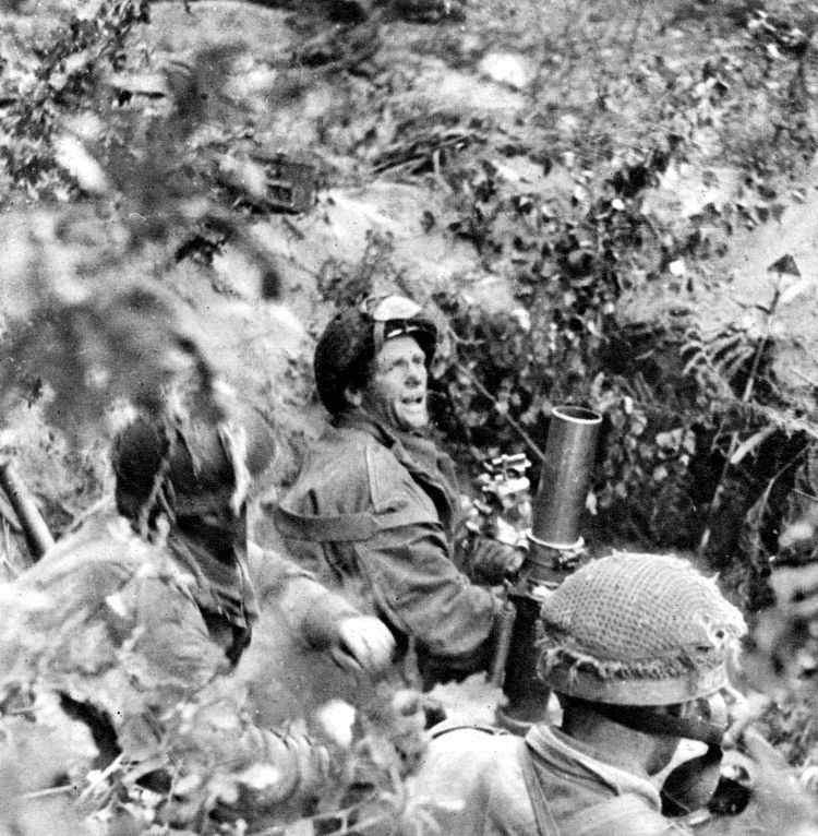 Airborne troops engaging the enemy with 3-inch mortars during Operation Market Garden in Arnhem