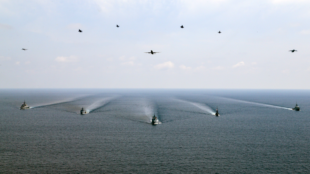 An aircraft pass over involving warships during the exercise, with HMS Spey positioned on the far right (Picture: Royal Navy)