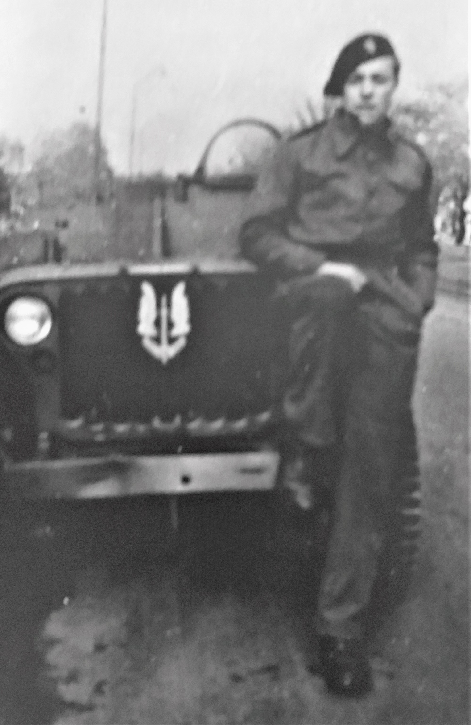 Alec Borrie of 1 SAS stands in front of Jeep. Credit: Alec Borrie.