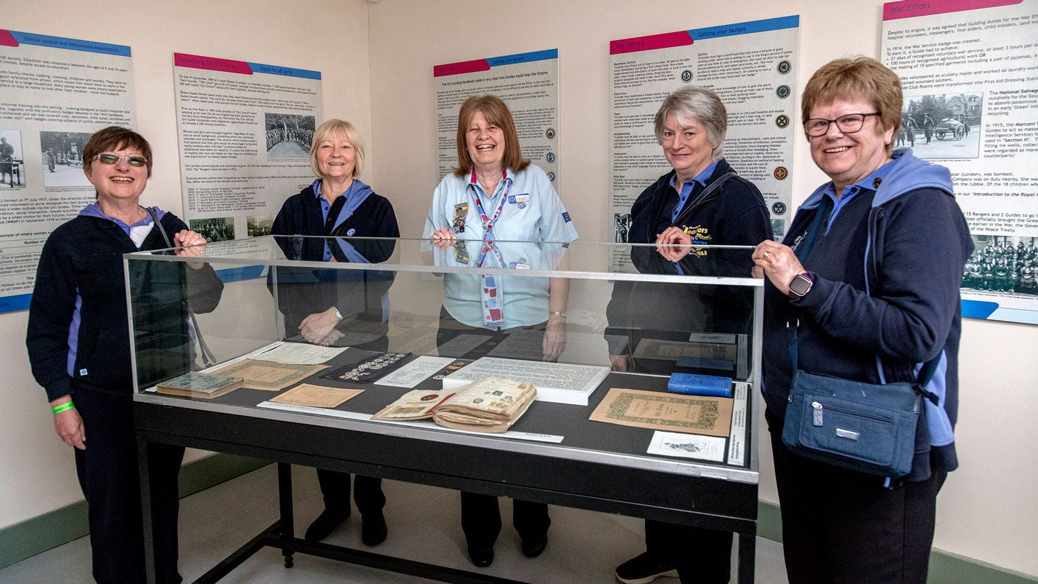 Alison Tompkinson, County Commissioner, Girlguiding Essex South East, with her colleagues looking at the Stow Maries Great War Aerodrome museum exhibition (Picture: Mr Dave Davies of SMGWA).