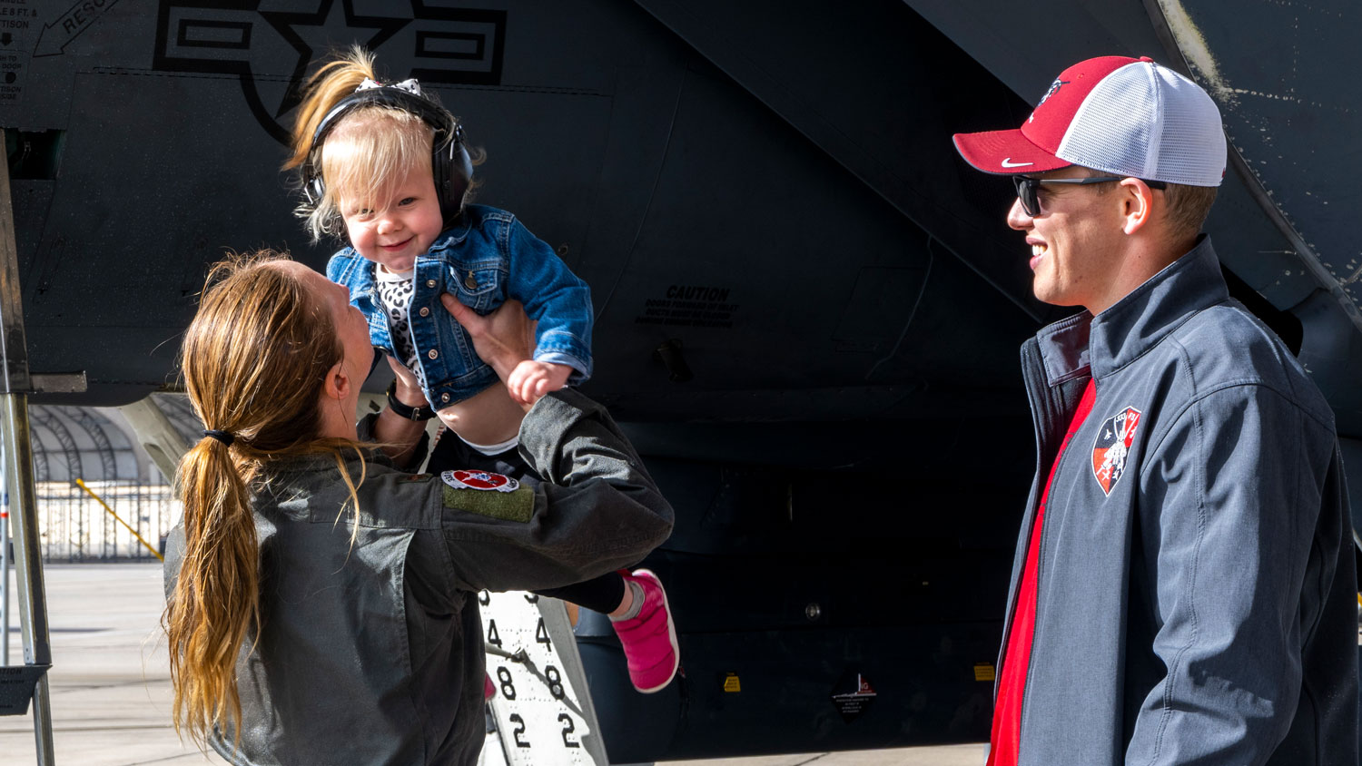 Major Tiffany McElroy, 333rd Fighter Squadron instructor weapons systems officer, hugs her daughter after completing her final flight Image ID 221114-F-XN600-1099 CREDIT US Air Force AND Senior Airman Kylie Barrow