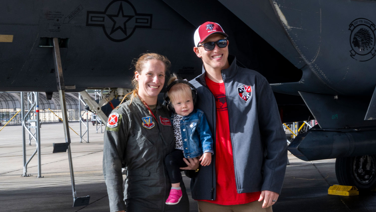 Major Tiffany McElroy, 333rd Fighter Squadron instructor weapons systems officer, poses with her husband and daughter at Seymour Johnson Air Force Base, North Carolina, November 2022 CREDIT US Air Force AND Senior Airman Kylie Barrow