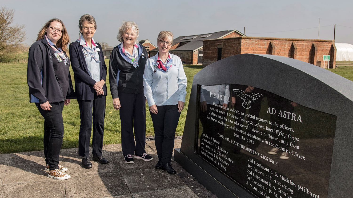 Alleen Beck, Catherine Murry, Helen Green and Tracy Foster stand by the memorial dedicated to the officers of 37 Squadron who made the ultimate sacrifice CREDIT Mr Dave Davies of SMGWA