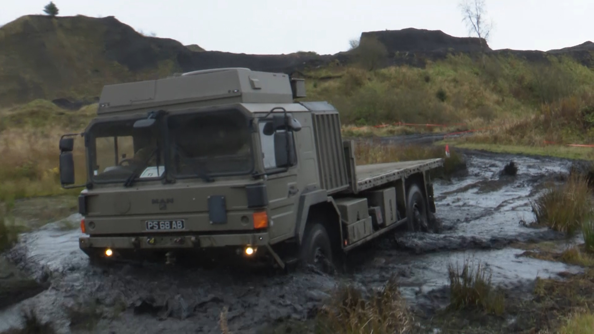 An Army vehicle navigates its way through boggy terrain during the two-day event.