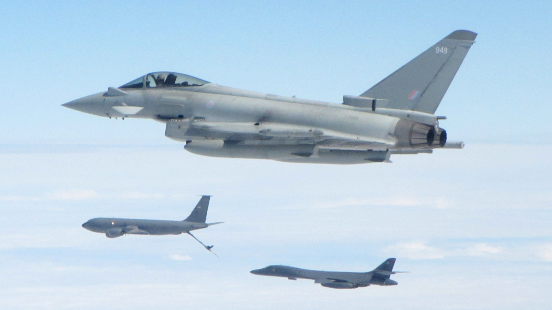 An RAF Typhoon aircraft from RAF Lossiemouth escorts a US B1B Lancer bomber over the North Sea as it is refuelled by a US KC135 Stratotanker (Picture: RAF).