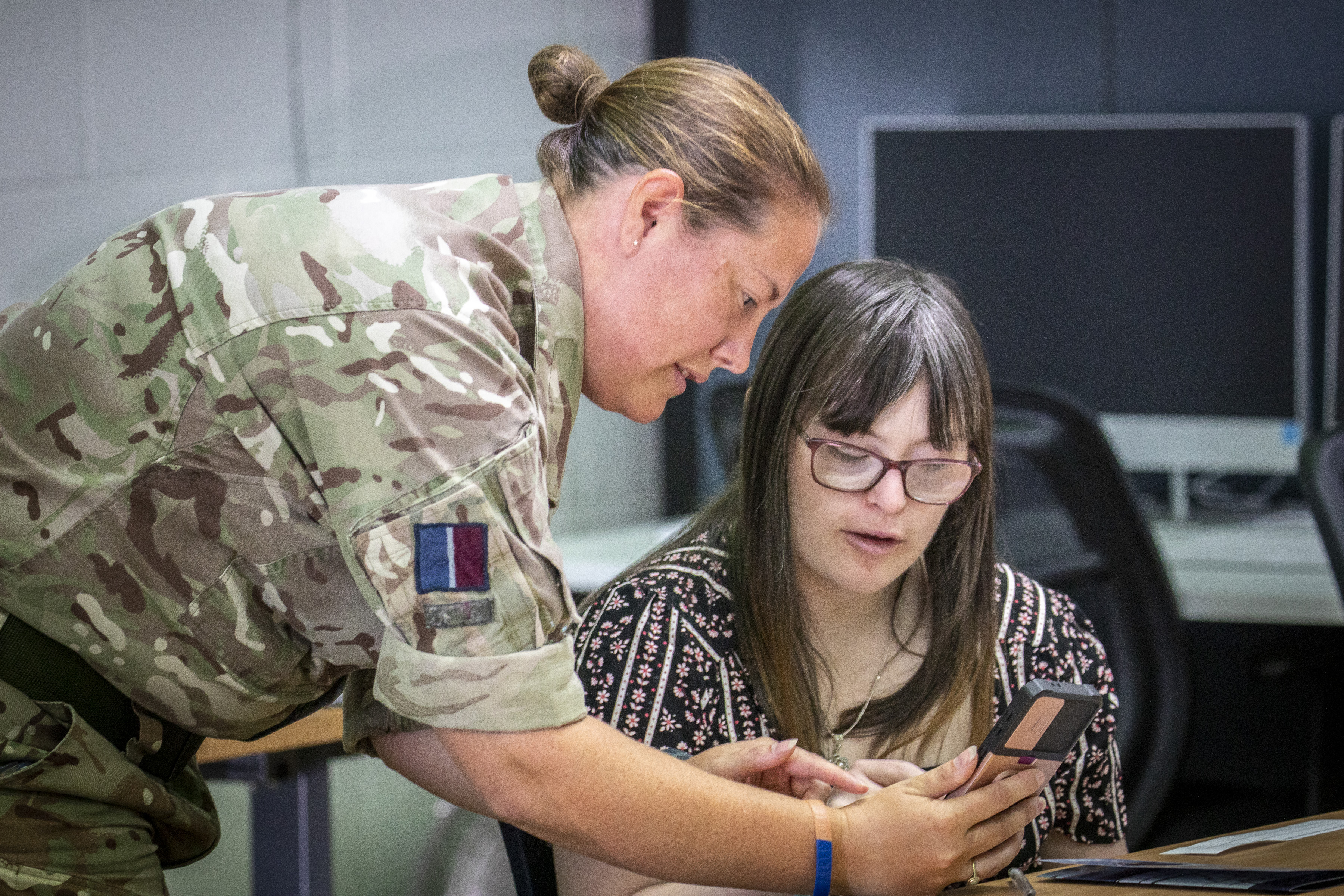 An RAF aviator speaks to a student in Darwin Australia (Picture: RAF).