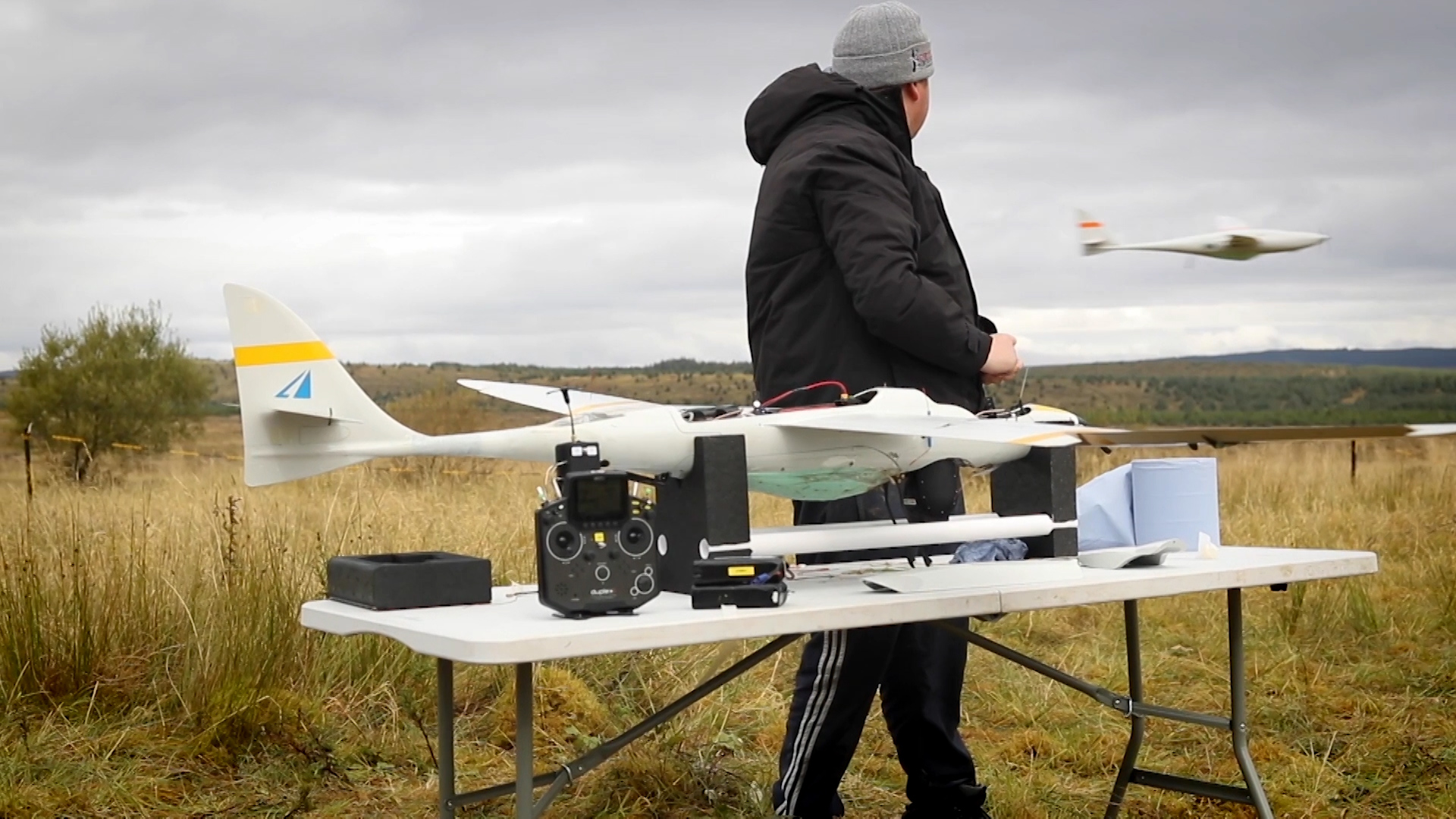 An operator flies a drone as part of an evaluation of swarming Uncrewed Aerial Vehicles in the UK (Picture: Dtsl).