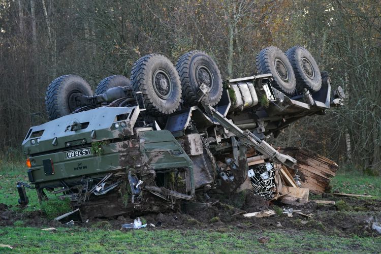 An overturned military vehicle sits in the middle of the Keir roundabout on the A9 near Dunblane after an accident there