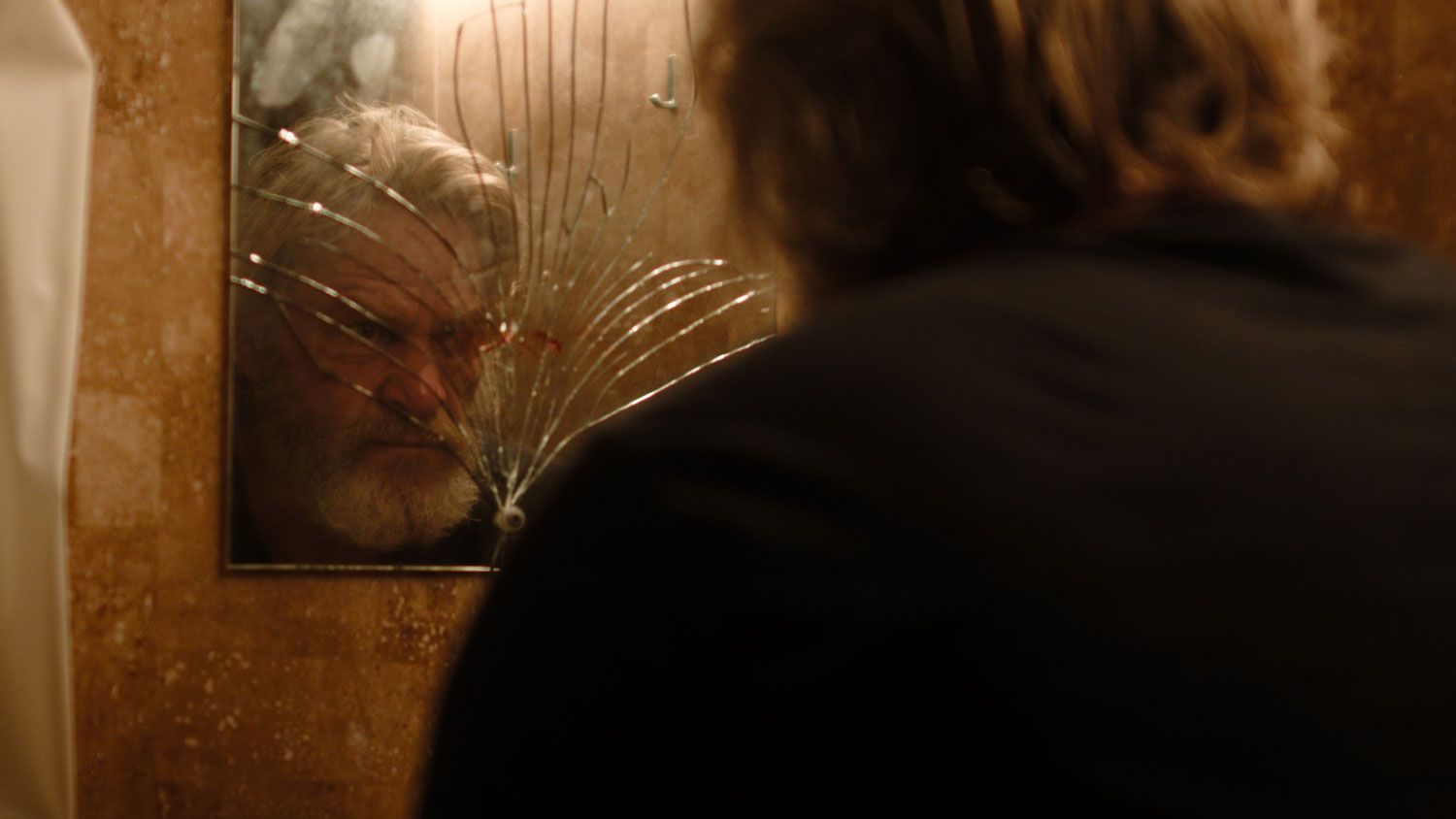 Andy, played by veteran turned actor Tip Cullen, looks at himself in a broken mirror CREDIT Sunray Fallen Soldier
