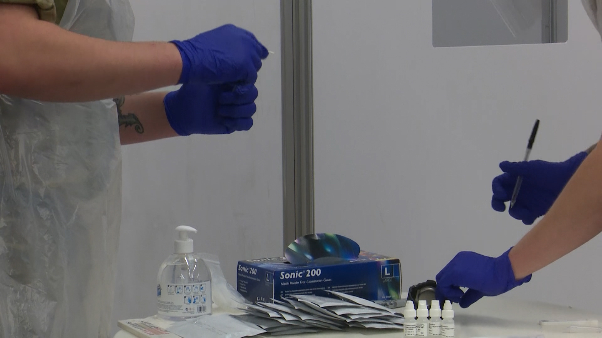 Anon military personnel helping with coronavirus testing in Liverpool during pilot scheme 