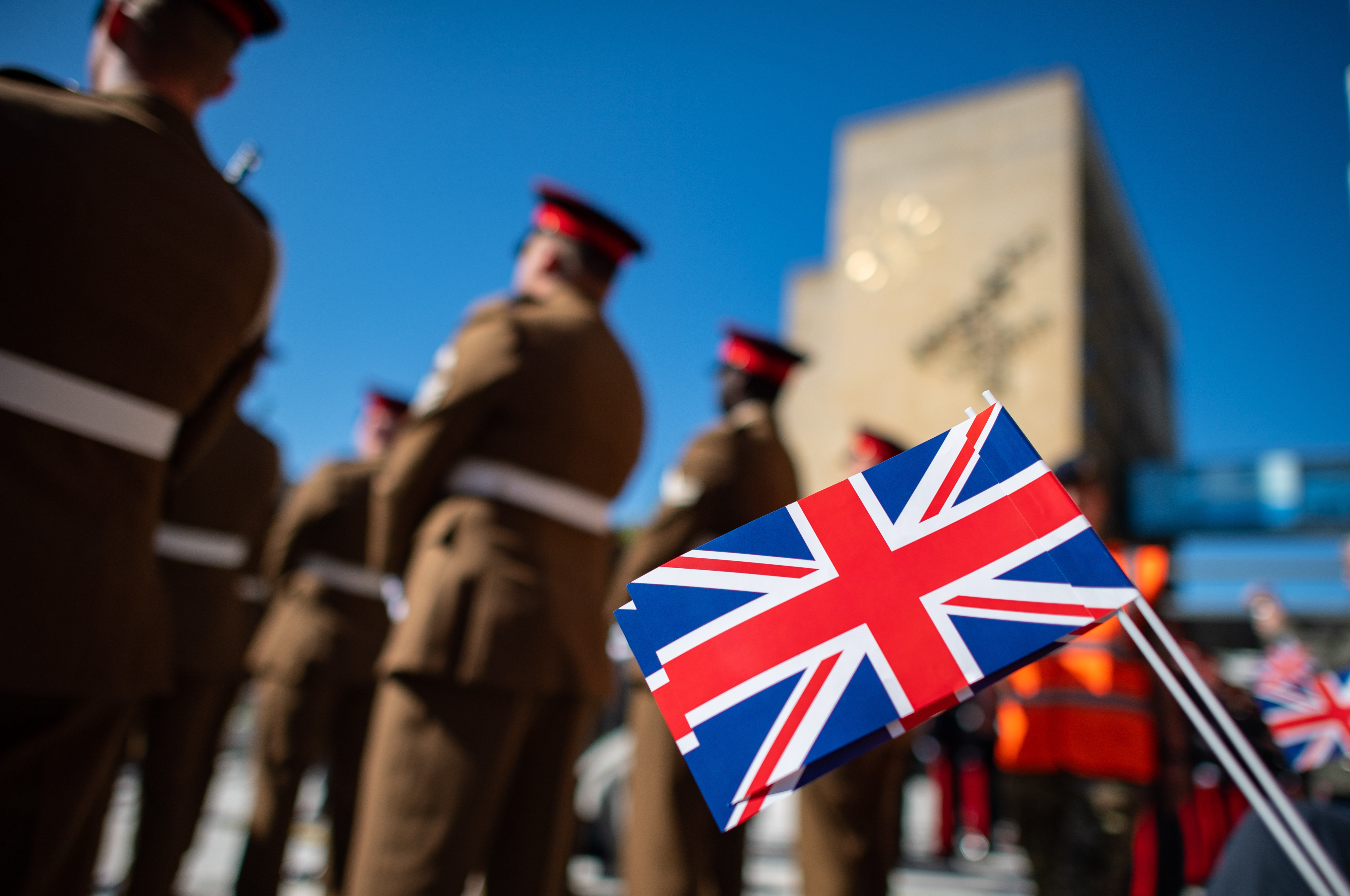 Anonymous - Spectator waving a Union Jack at the farewell of the British soldiers in Gutersloh (Picture: PA).