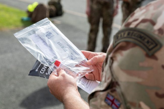 Anonymous RAF Regiment member carrying COVID coronavirus test kit 240920 CREDIT MOD