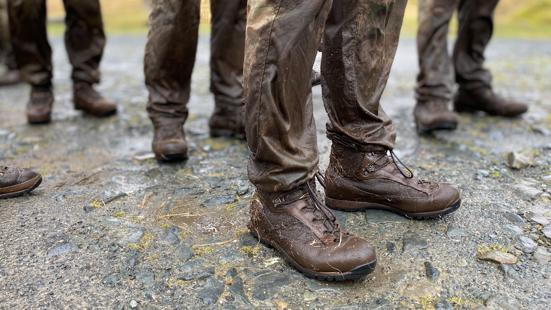 Anonymous Royal Marines with mud and grass on their uniform and boots during the 30-miler test 230222 CREDIT BFBS.jpg