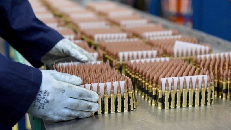 Anonymous hands moving munition at BAE Systems site Radway Green, Cheshire