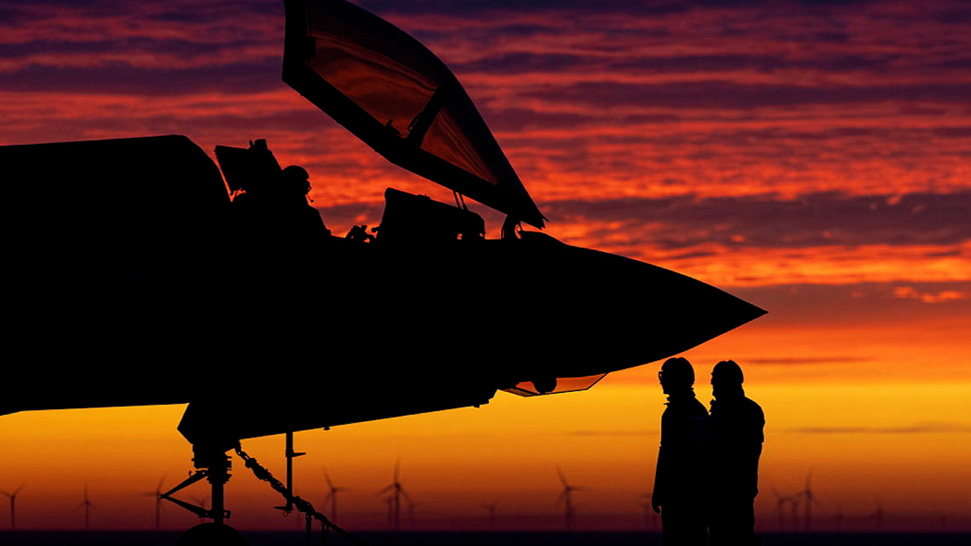 Personnel alongside an F-35B from 617 Squadron preparing for night flying training exercises whilst on Operation Achillean and deployed on HMS Queen Elizabeth (Picture: MOD)