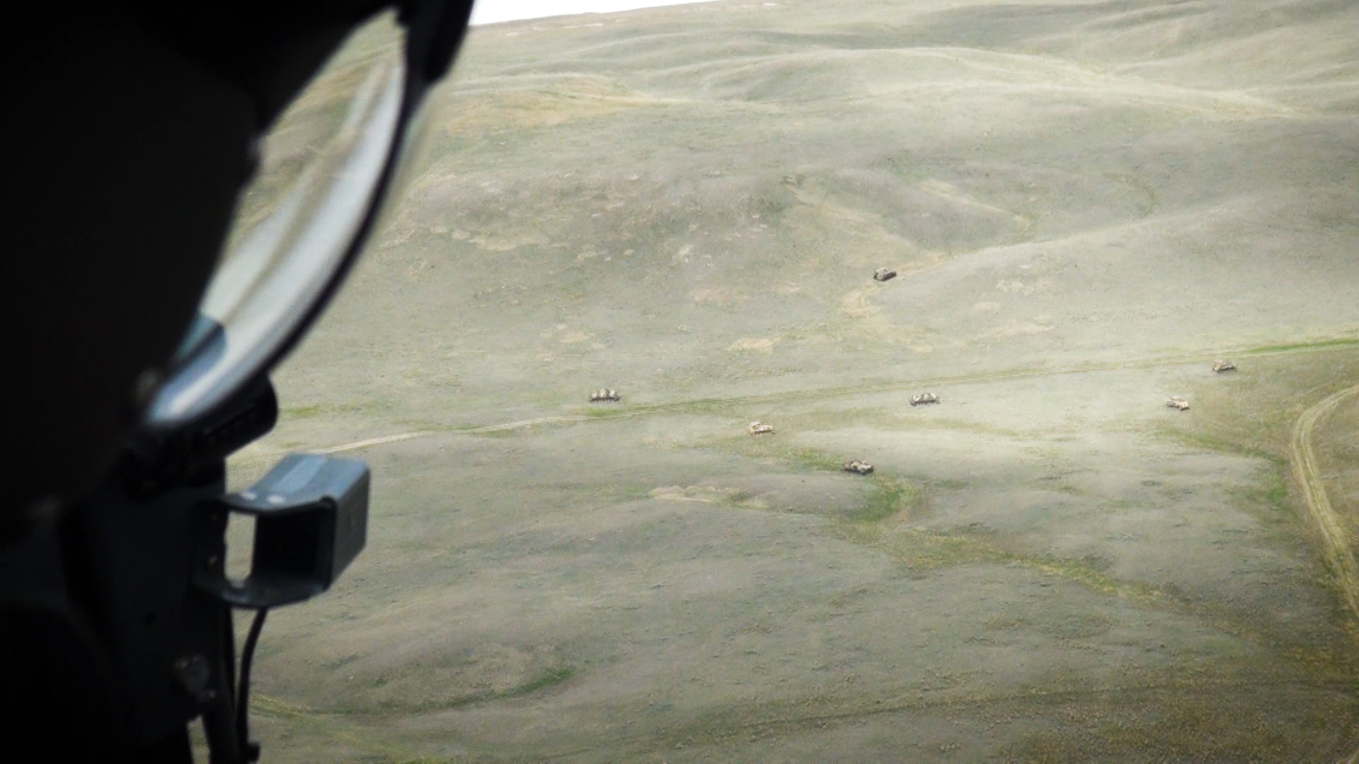 Anonymous service person looking over British Army Training Unit Suffield.