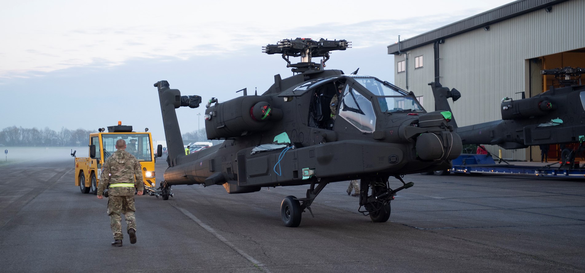 Cover image: One of the Apaches is unloaded from an aircraft at Wattisham Flying Station in Suffolk (Picture: British Army).