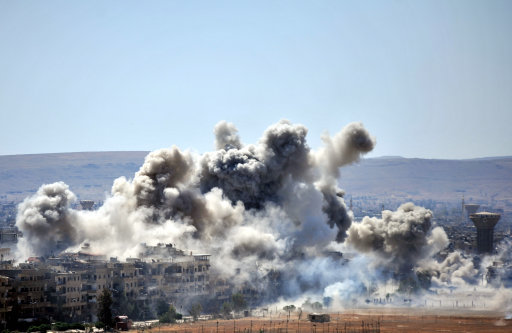 Smoke rises after an attack in Damascus (Picture: PA).