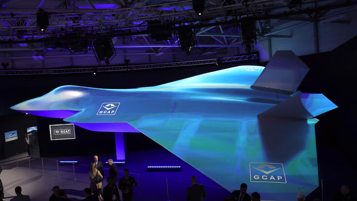 Attendees view the GCAP (Global Combat Air Programme) concept model fighter plane at the BAE Systems pavilion 150124 CREDIT- REUTERS, DON'T USE AFTER 30 DAYS