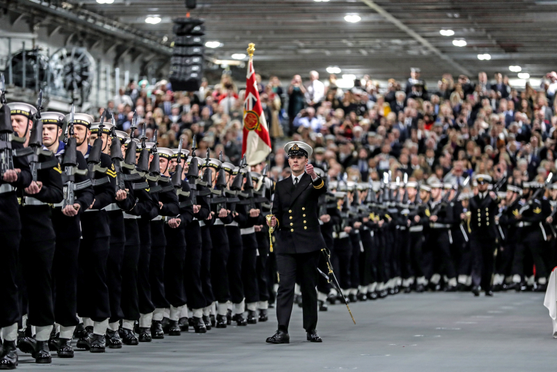 the ships company (HMS Prince of Wales), seen here on parade for the ships commissioning into the Fleet, at HM Naval Base Portsmouth.