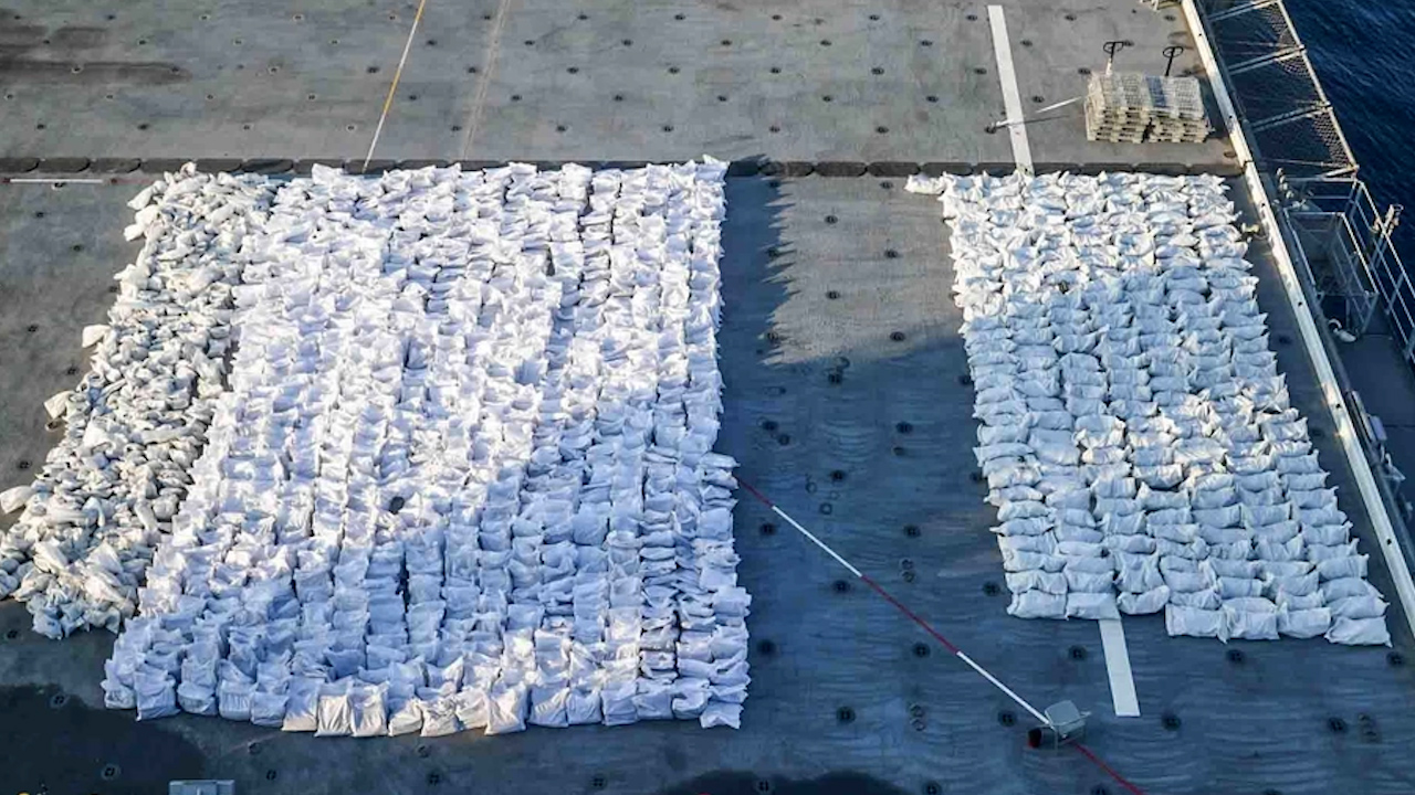 Bags containing more than 50 tons of fuses and propellants for rockets and ammunition rounds sitting on the flight deck of the USS Lewis B. Puller seized in the Gulf of Oman (Picture: US Navy).