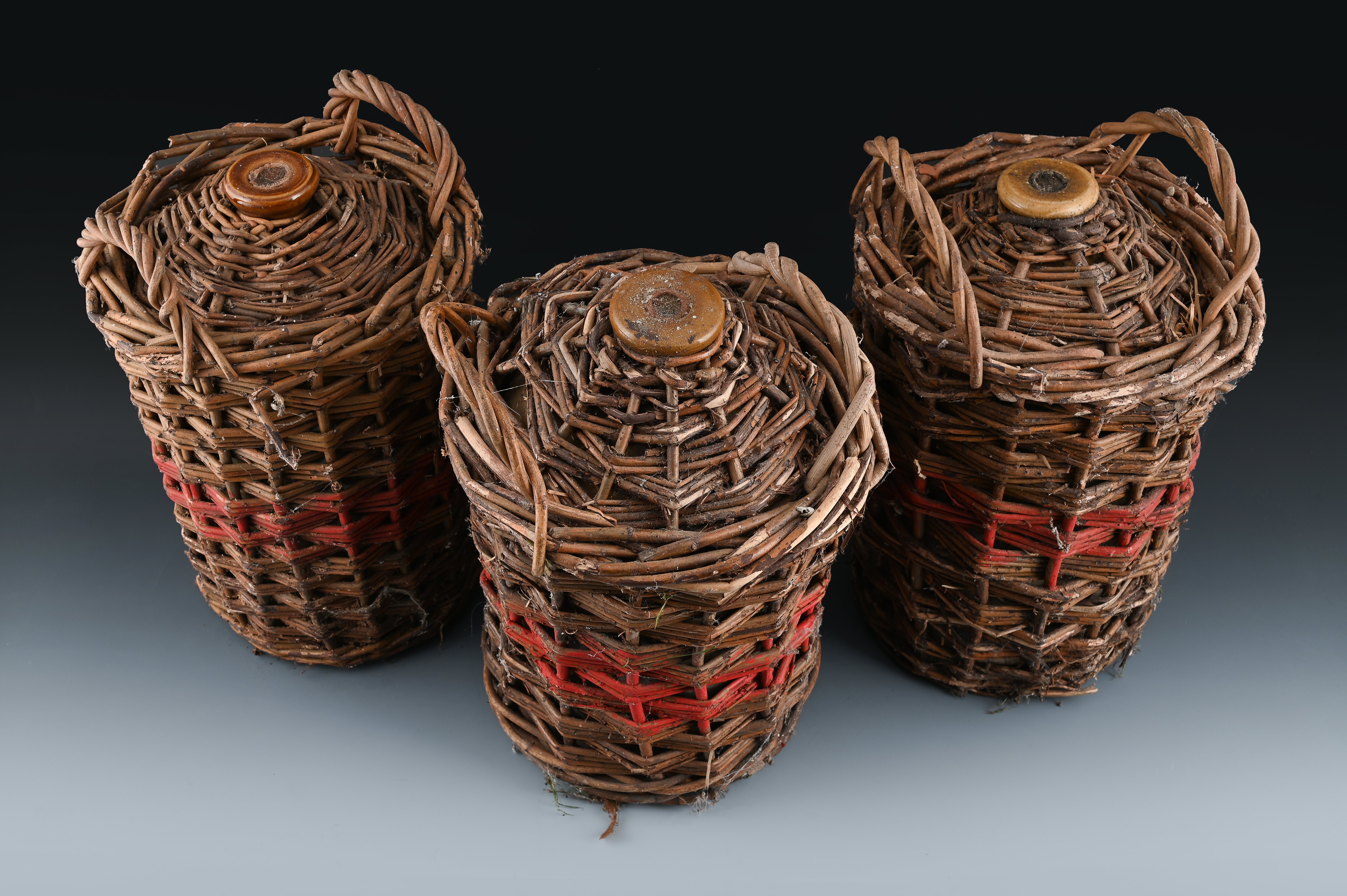 Three flagons from the last-ever batch of dark rum issued by the British Ministry of Defence to its sailors are to go under the hammer at auction (Picture: Dreweats).