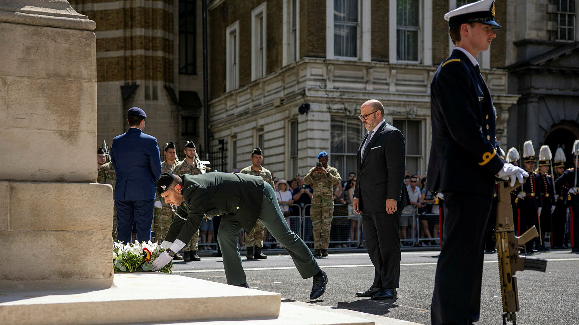 Belgian Minister of Security and Interior Bernhard Quintin looks on at the wreath-laying ceremony