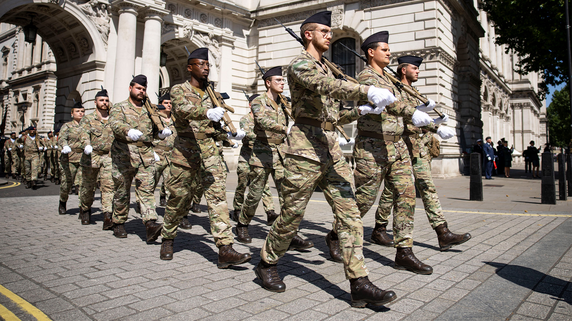 Belgian soldiers have the rare privilege to be able to carry arms on parade in the UK