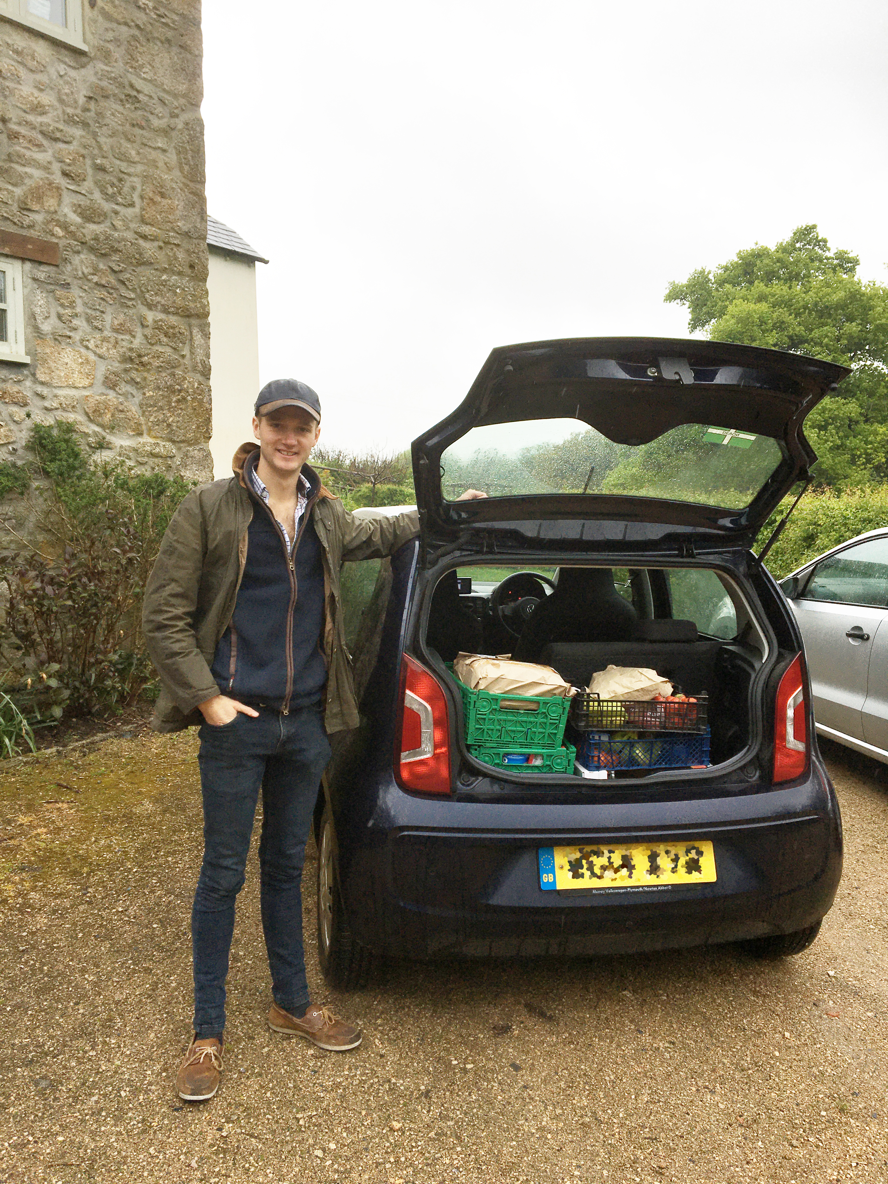 Cover image: Ben Baily with provisions he's delivering (Picture: Royal Navy).