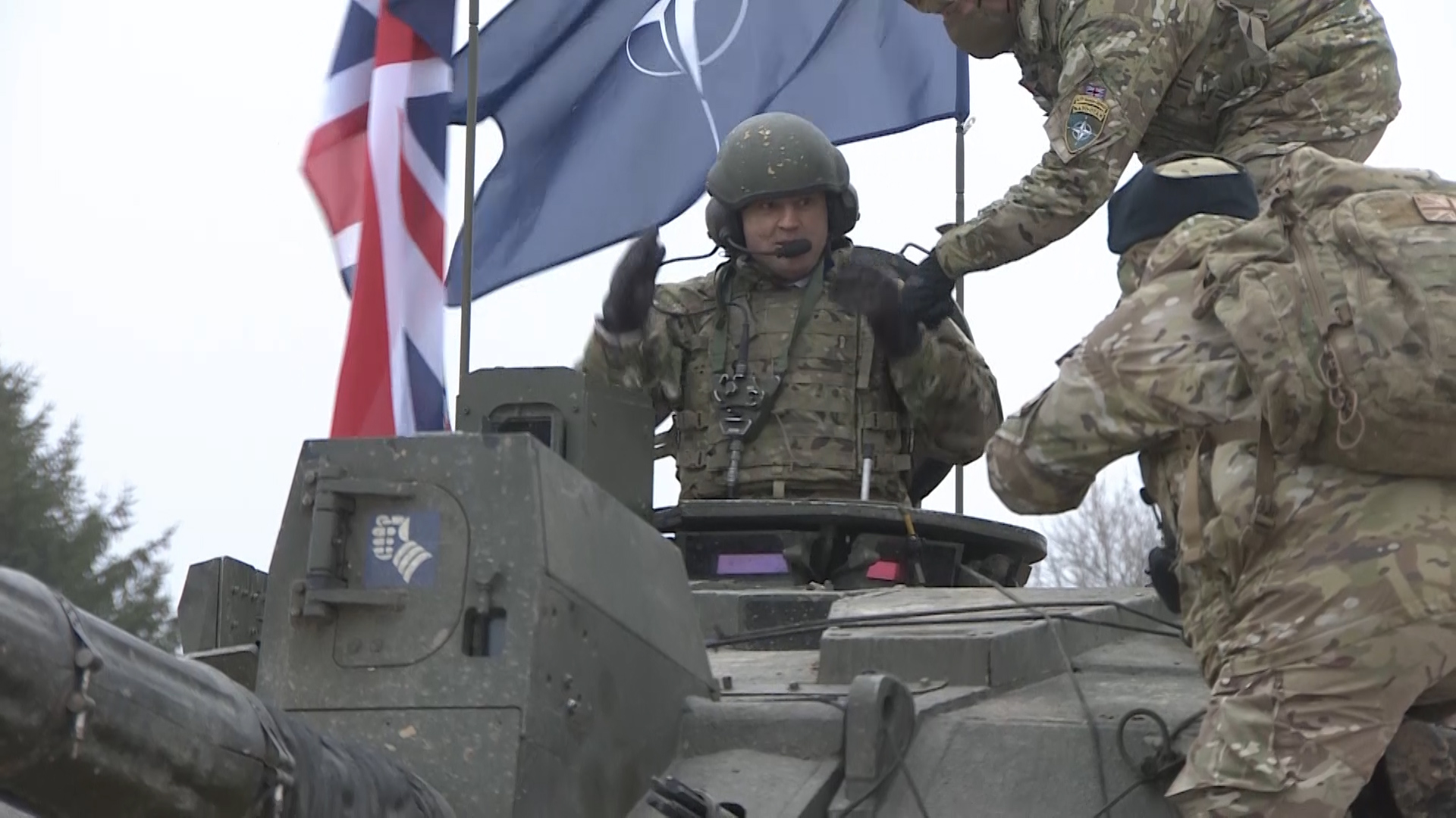 Mr Wallace also got the chance to get inside one of the Challenger II tanks during the visit to the Tapa Army Base.