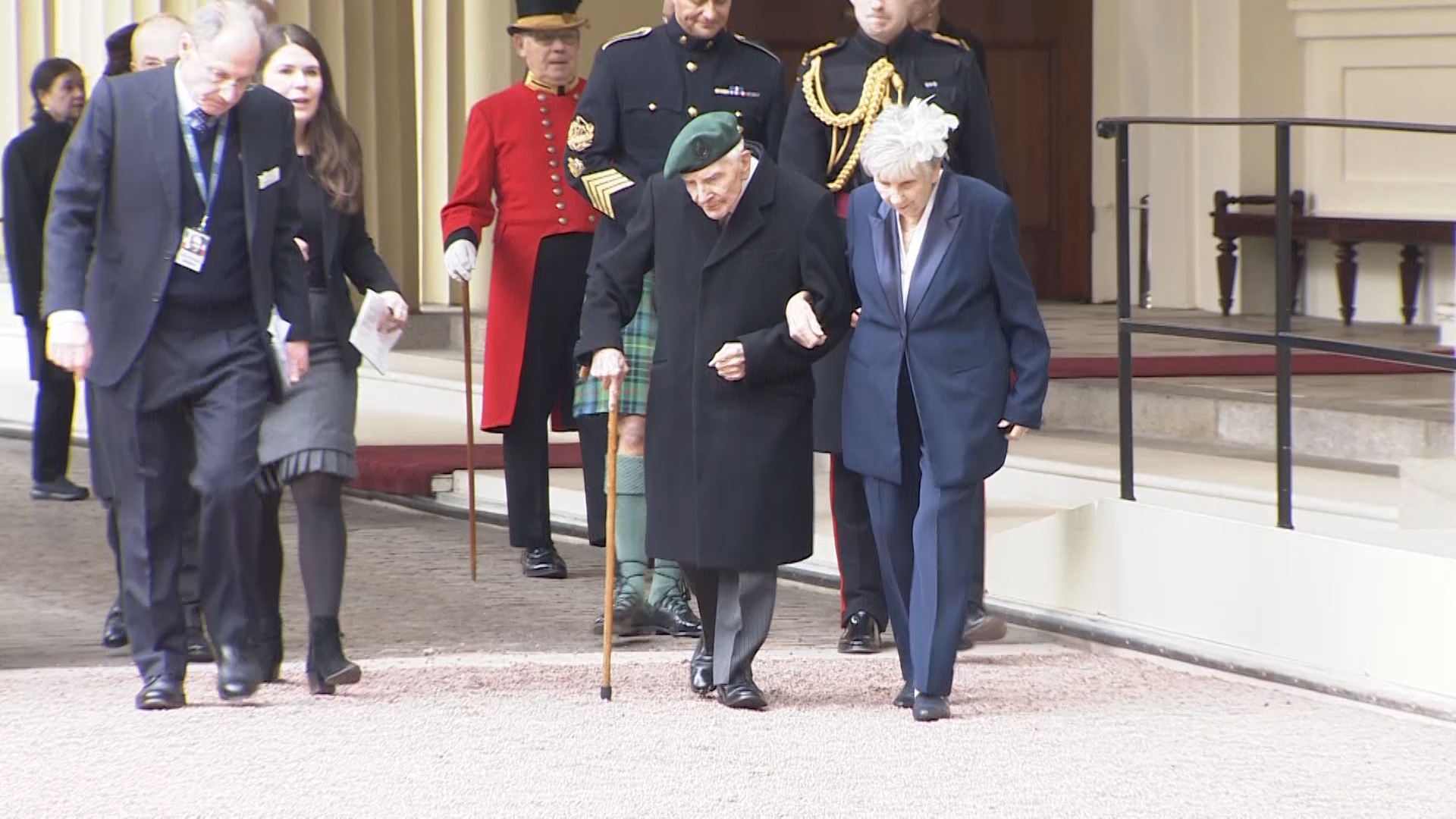 Billinge and his wife after investiture MBE ceremony