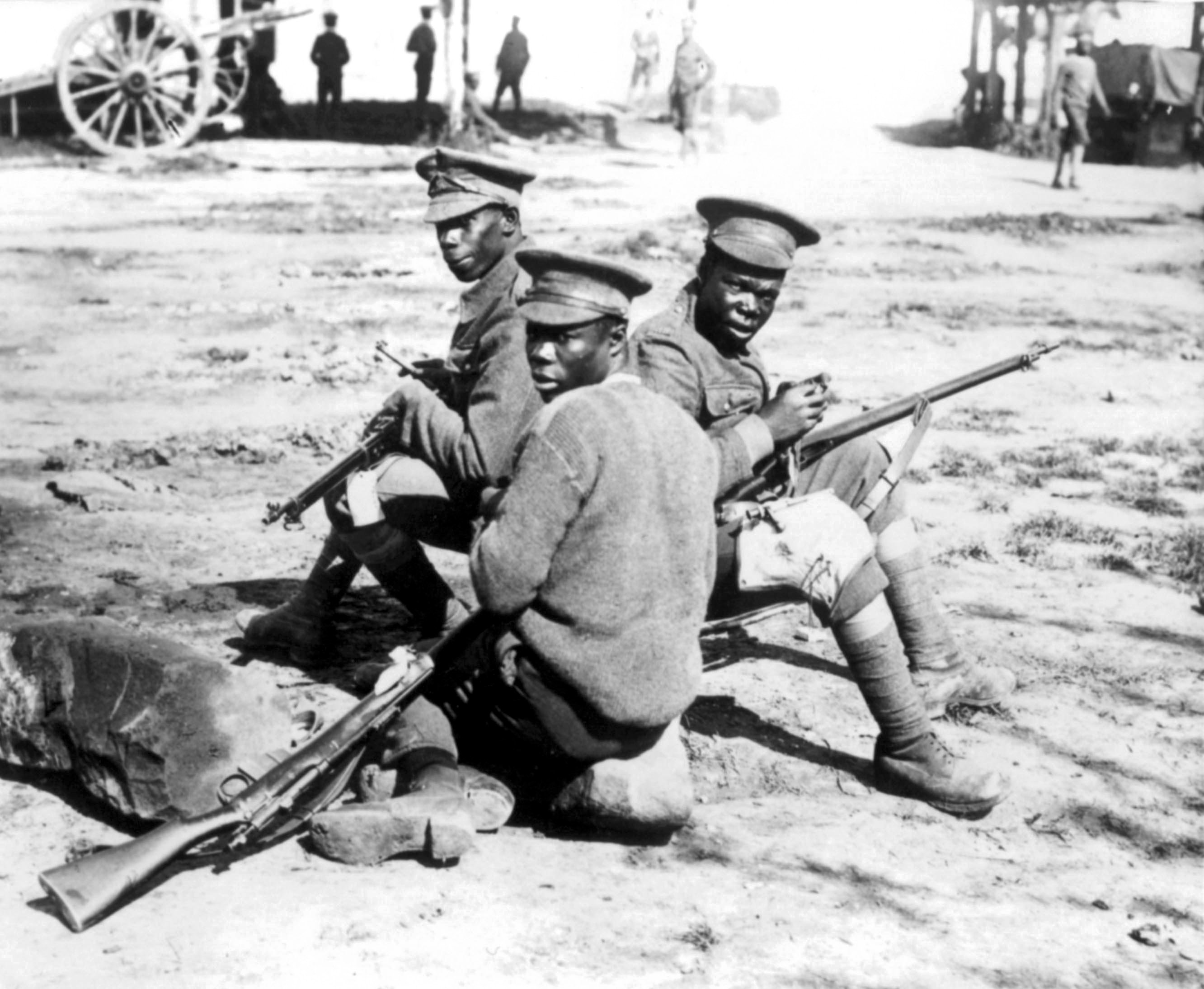 Troops of the British West Indian Regiment clean their Lee Enfield rifles Credit: Topham/PA Archive/PA Images