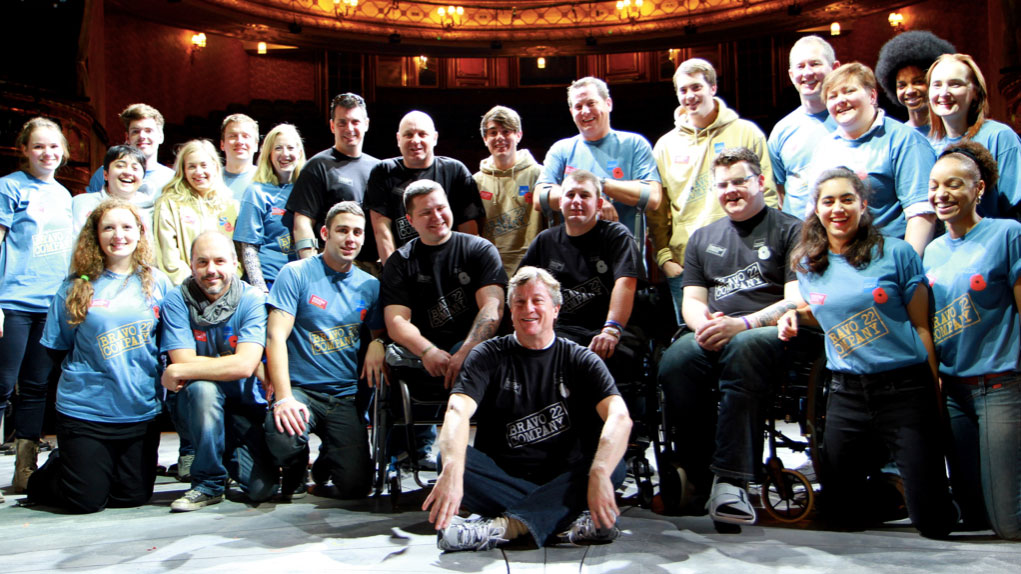 Bravo 22 Company participants pose for a photo on stage Picture Bravo 22 Company