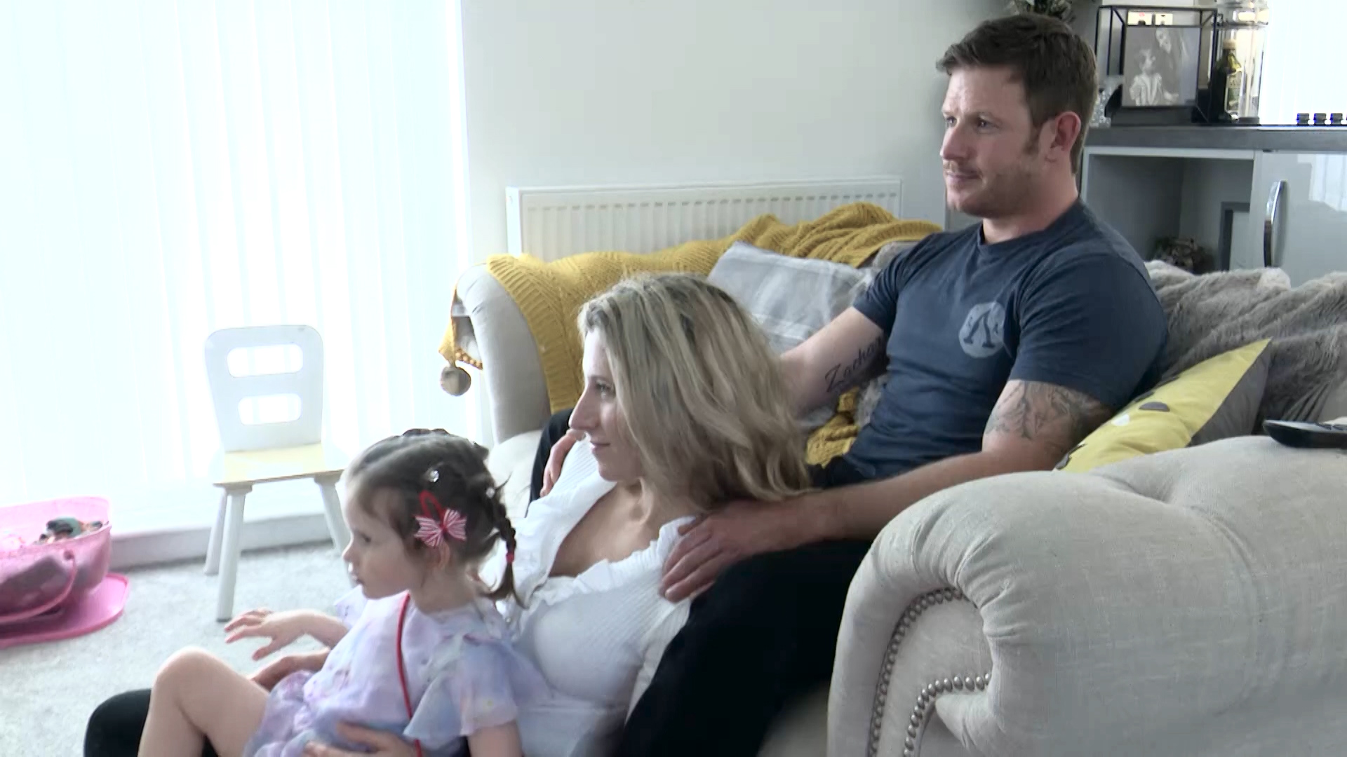 Breya with her parents, Holly and Ollie.