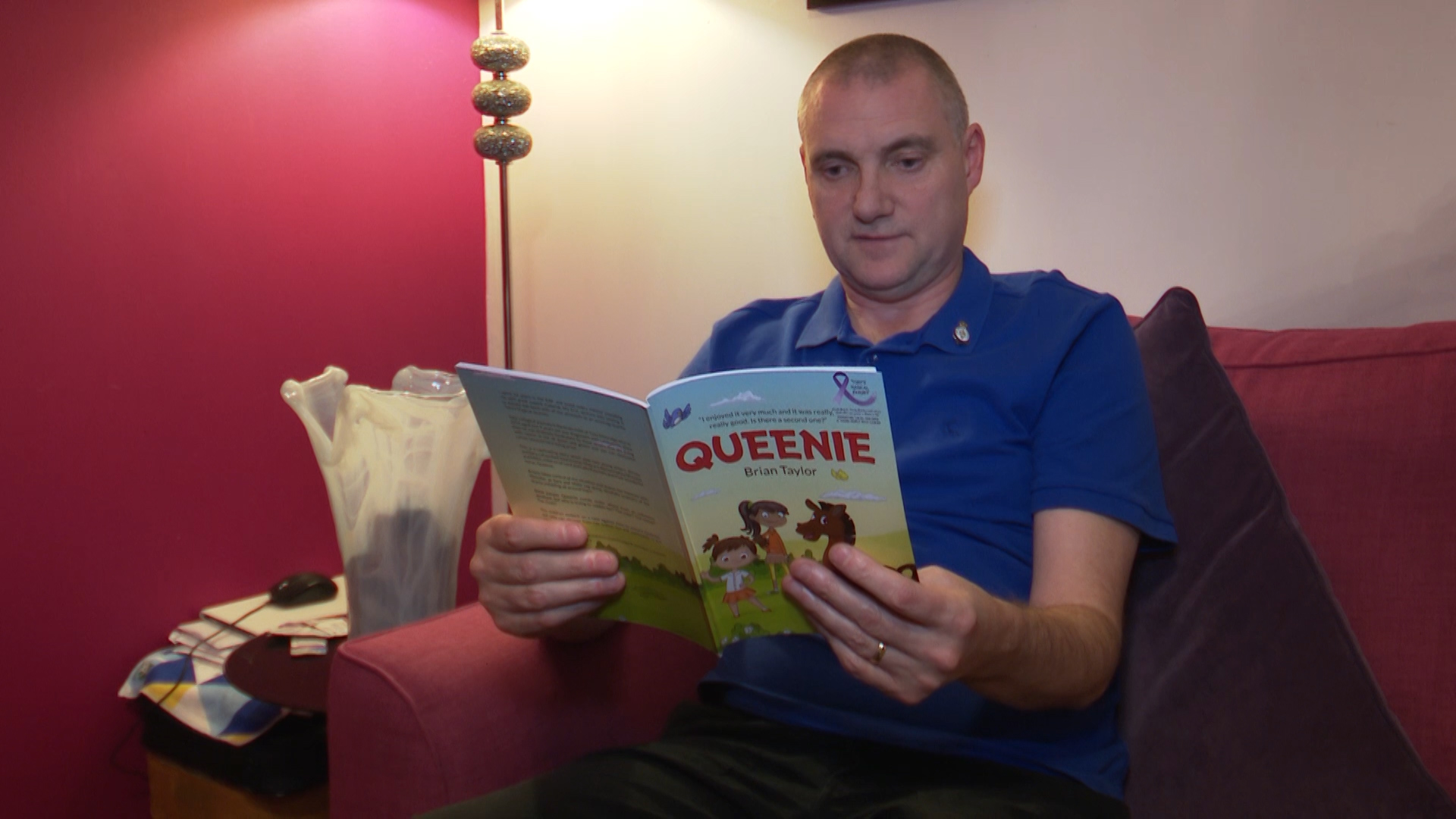 Brian with book Queenie 101219 CREDIT BFBS.jpg