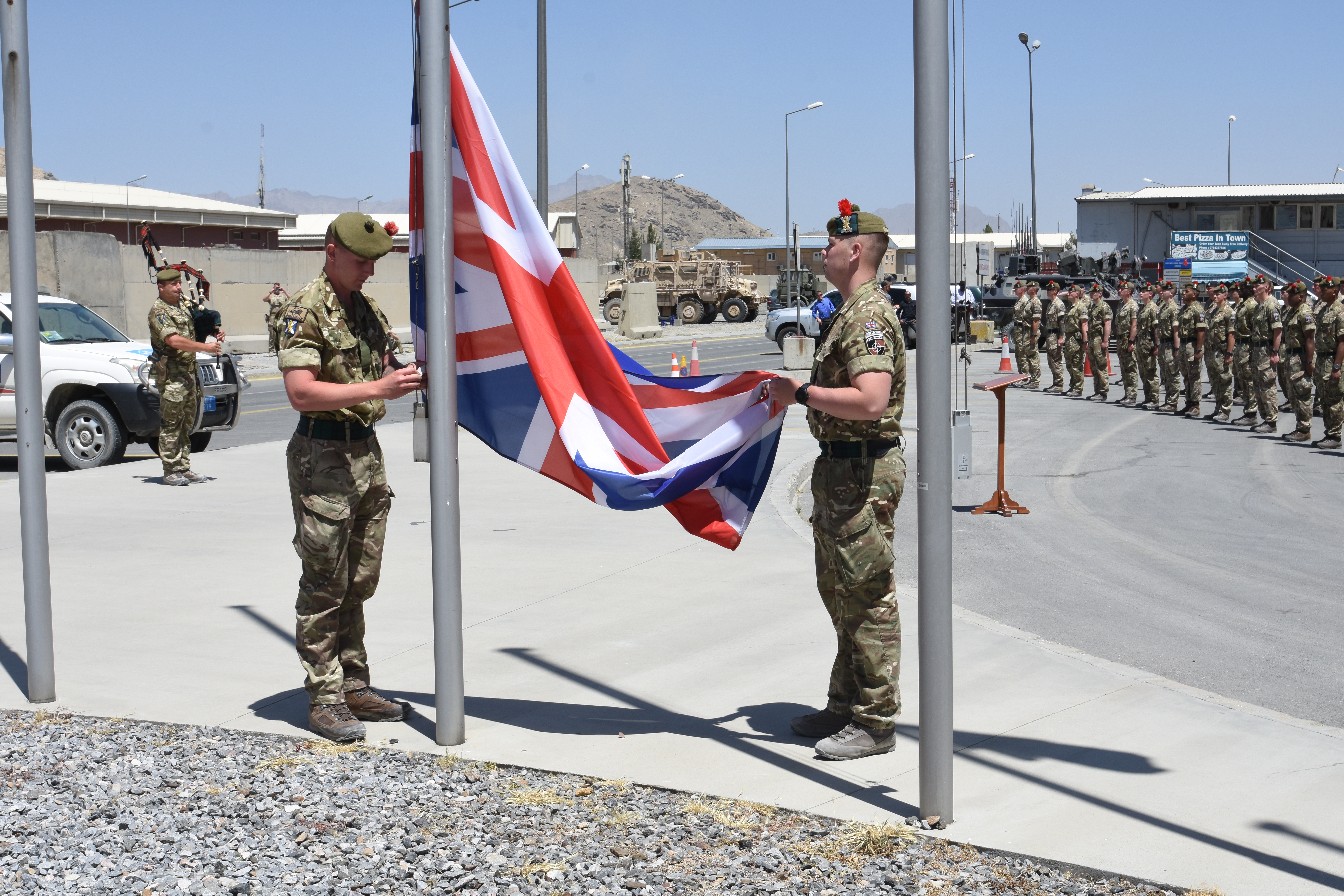 Brigadier Oliver Brown, General Miller and the UK Ambassador at a flag lowering ceremony in Afghanistan 24062021 CREDIT MOD