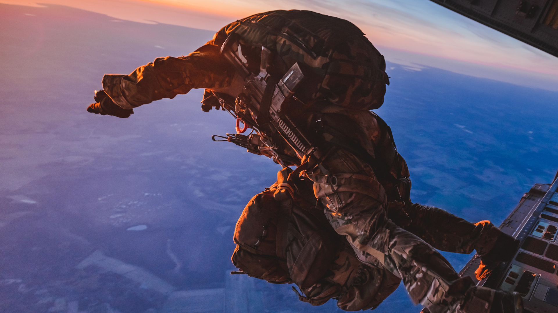 British Army Pathfinder jumping out of an RAF C-17 Globemaster above Estonia as part of a Nato exercise