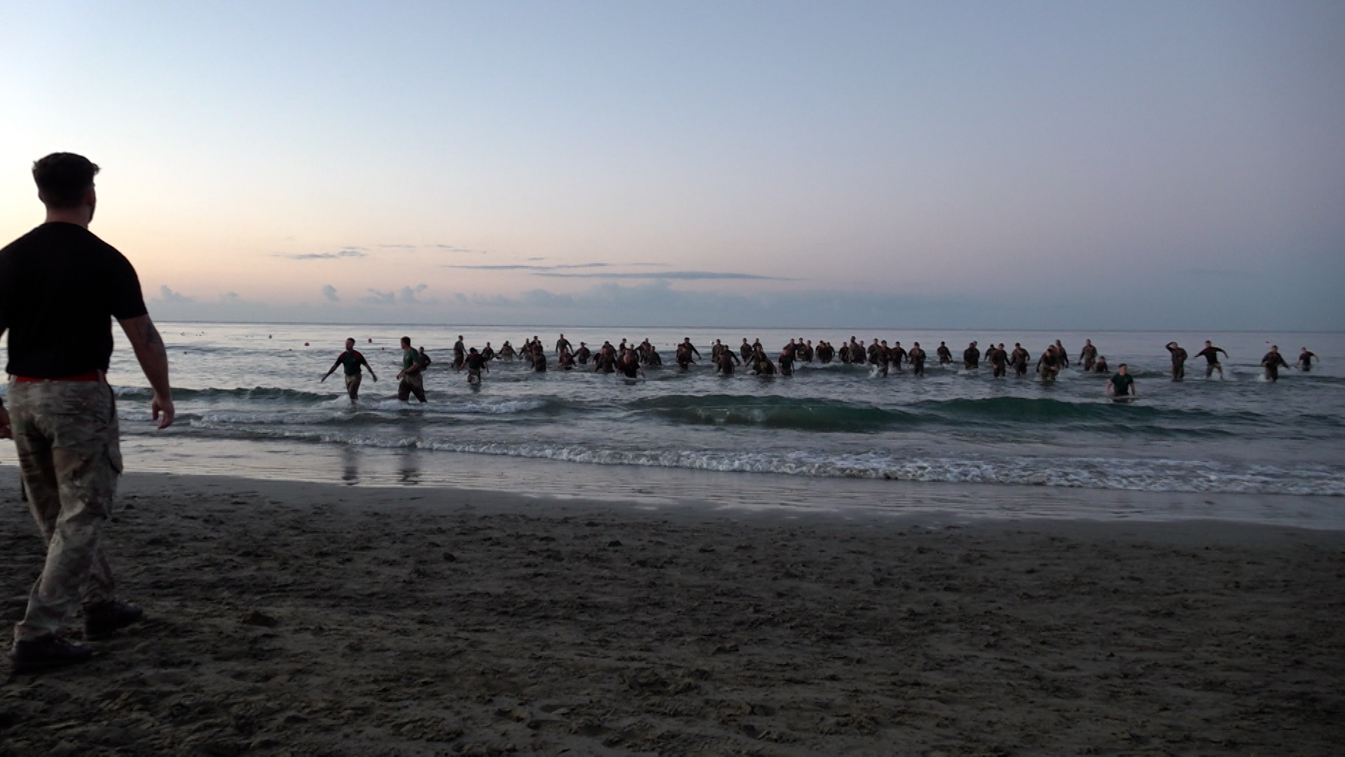 British Army personnel emerging from the water while taking part in a Junior Non-Commissioned Officer Cadre course 130124 CREDIT BFBS